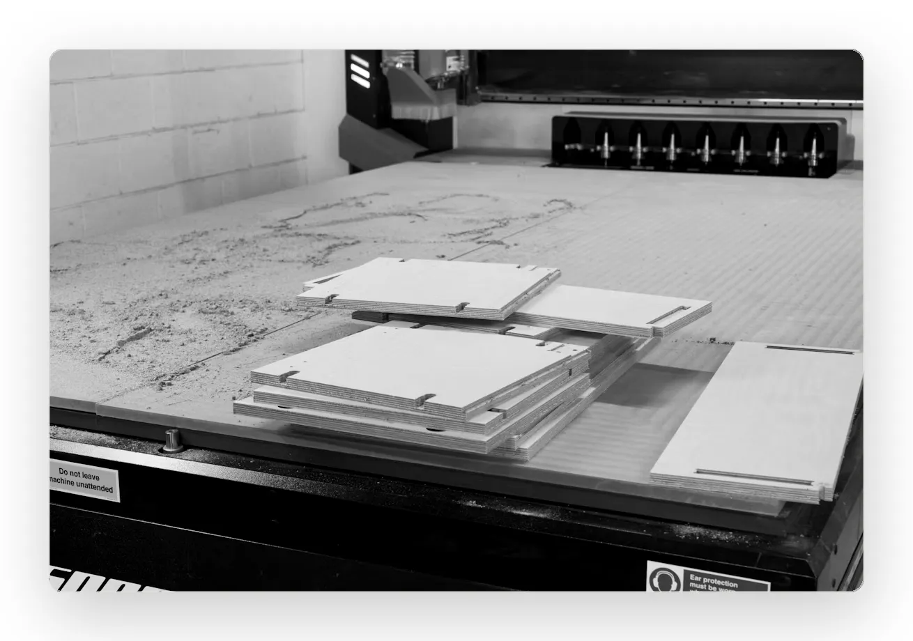 Cabinet parts machined on a CNC router in a millwork shop