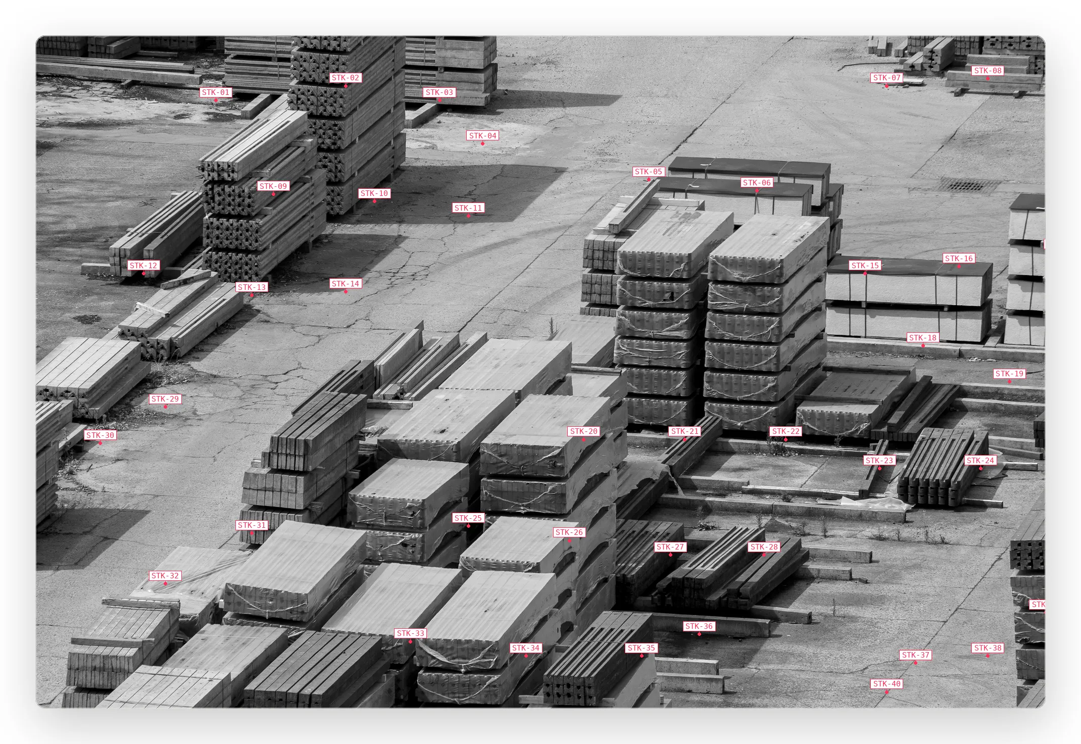 Aerial view of a materials yard with every stack labeled by code